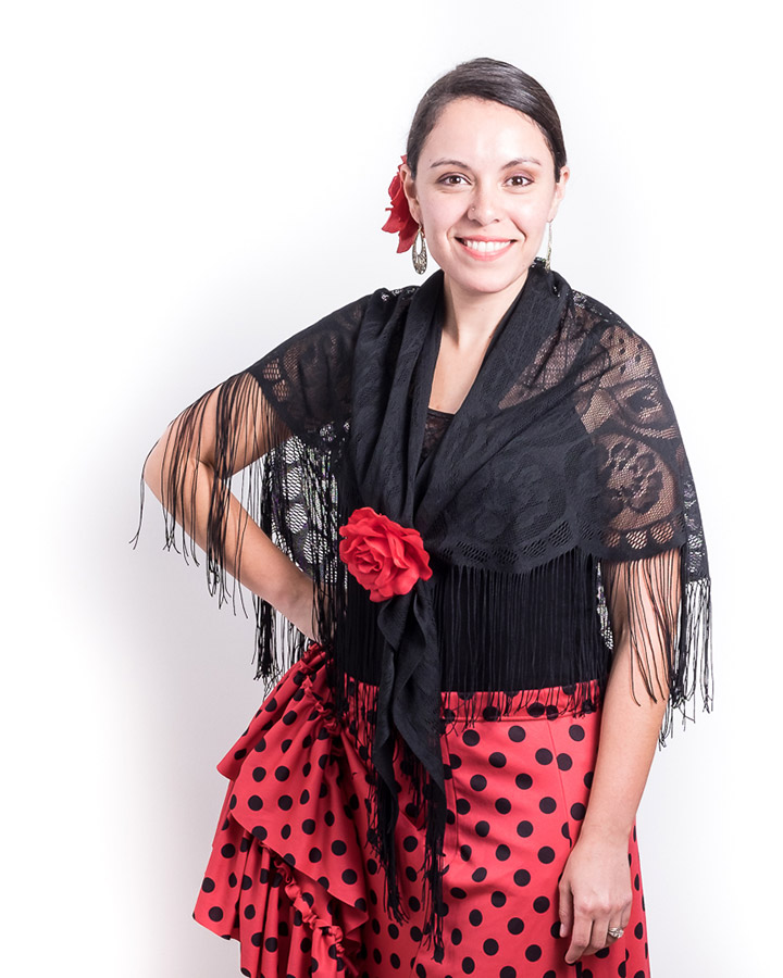 A portrait of Adriana Nelson in a flamenco dress